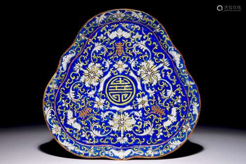 A Chinese polychrome triangular dish with 'Shou' characters, 19th C.