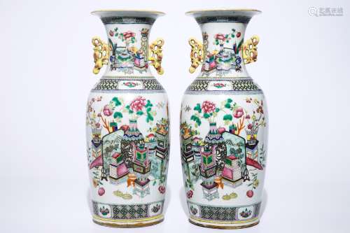 A pair of Chinese famille rose vases with 