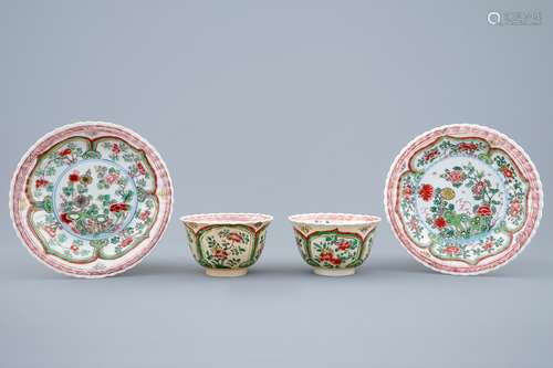 A pair of Chinese famille verte cups and saucers, Kangxi