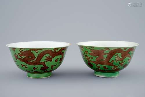 A pair of Chinese green and aubergine dragon bowls, Kangxi mark and of the period