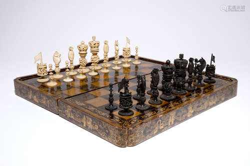 A fine Chinese lacquer chess and backgammon board with ivory game pieces, 19th C.