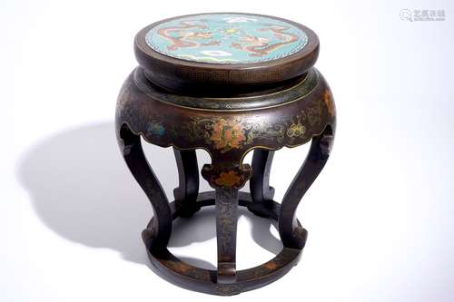 A Chinese lacquered wood and cloisonne stand, 20th C.