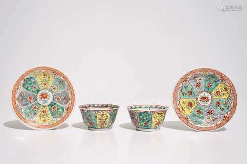 A pair of Chinese famille verte cups and saucers with floral ornamental design, Kangxi