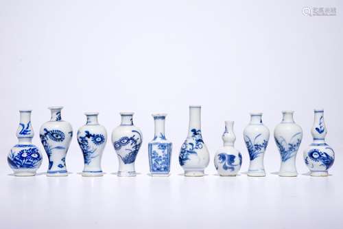 Ten Chinese blue and white miniature dolls house vases, mostly Kangxi