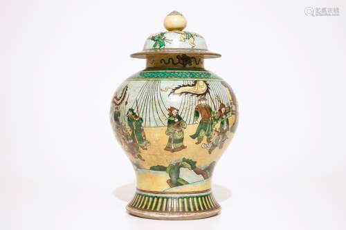 A Chinese famille verte on yellow ground baluster jar and cover, 19th C.