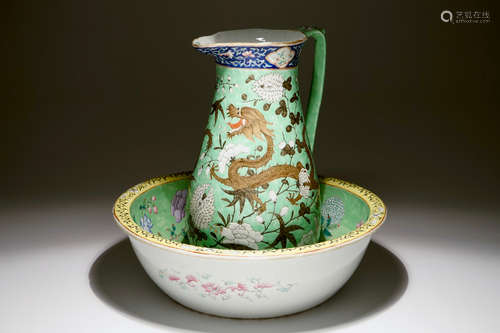 A large Chinese water jug and basin with black dragons on a lime green ground, 19th C.