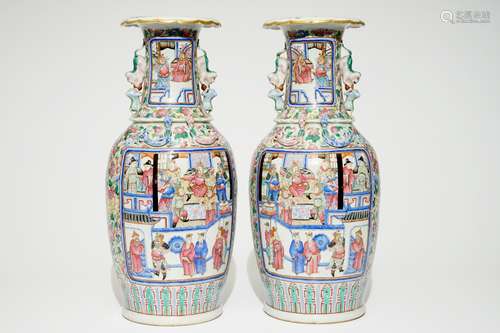 A pair of Chinese famille rose vases with court scenes, 19th C.