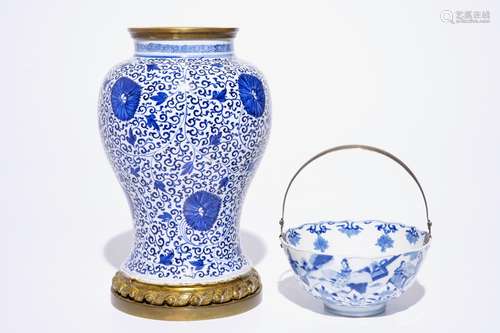 A blue and white Chinese silver-handled bowl, Kangxi mark and of the period, and a bronze-mounted vase, Kangxi