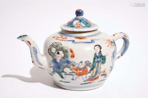 A Chinese wucai teapot and cover with figures in a garden, 19th C.