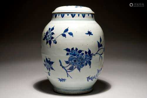 A Chinese blue and white ovoid jar and cover with floral sprigs, Transitional period, Chongzhen