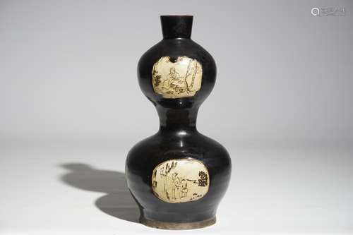 A Chinese black-glazed cizhou double gourd vase, Yuan or Ming