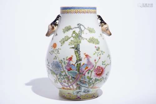 A Chinese famille rose hu vase with phoenixes and deer head handles, Qianlong mark, 19/20th C.