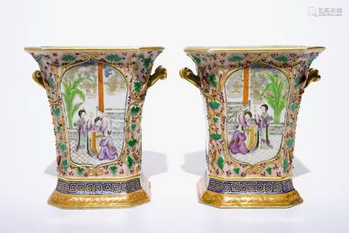 A pair of Chinese famille rose export bough pots with twisted handles and relief-decorated squirrels, Qianlong