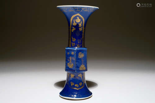 A Chinese powder blue and gilt gu vase, Kangxi