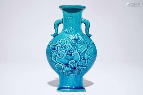 A Chinese turquoise relief-decorated moonflask with relief design, 19th C.