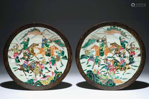 A pair of large Chinese Nanking famille rose warrior chargers, 19th C.