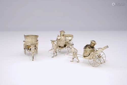 A Chinese silver rickshaw-shaped pepper and salt shaker and a mustard container, 19th C.