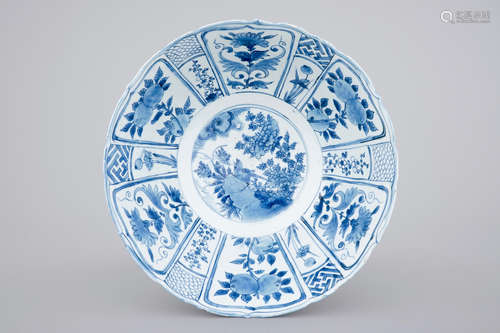 A Chinese blue and white kraak porcelain bowl with a bird among flowers, Ming, Wanli