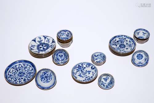 Ten Chinese blue and white on capucin brown ground cups and saucers, Kangxi