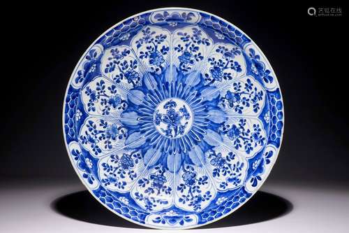 A Chinese blue and white charger with floral design, Kangxi