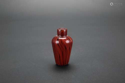 A Chinese Carved Possibly Agate Snuff Bottle