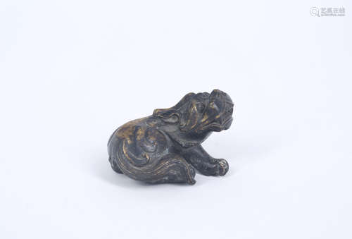 A Chinese Bronze Foo Dog