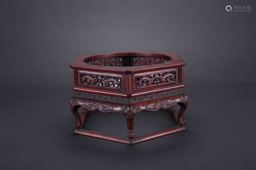 A Chinese Carved Huanghuali Water Pot Stand