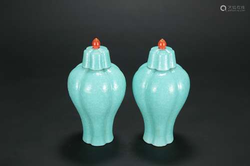 A Pair of Chinese Green Porcelain Vases with Covers