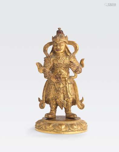 A SMALL GILT BRONZE GUARDIAN DEITYQing dynasty, 18th/19th century