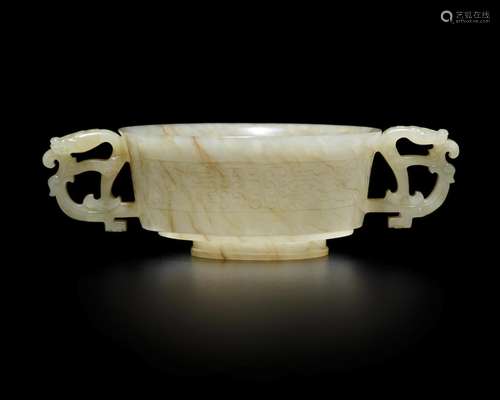 A FINE CARVED JADE CUP