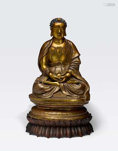 A GILT AND ENAMELED PORCELAIN FIGURE OF THE THEBUDDHAFujian hui guan mark, Republic period