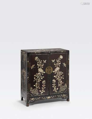 A MOTHER-OF-PEARL INLAID BLACKLACQUER CABINET19th century