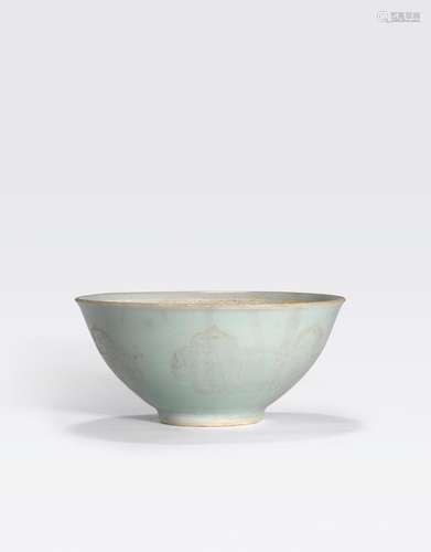 A CELADON GLAZED BOWL WITHCARVED ISLAMIC DECORATION16th/17th century