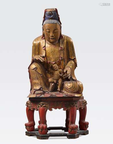 A MASSIVE POLYCHROME AND GILT LACQUERED WOODFIGURE OF GUANYIN, THE GIVER OF SONS, SONGZIGUANYINLate Qing dynasty