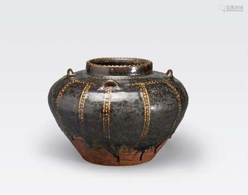 A BLACK GLAZED STORAGE JAR WITH WHITE SLIPDECORATION