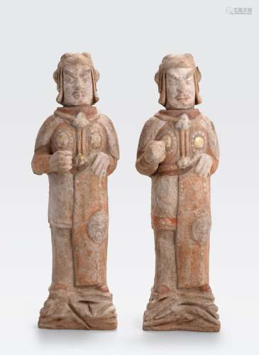 A PAIR OF PAINTED POTTERY WARRIORS