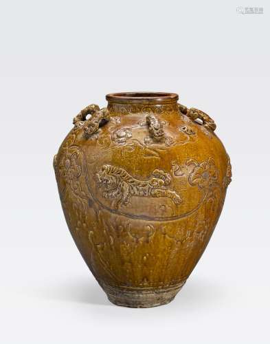 AN AMBER GLAZED STORAGE JARWITH TIGER AND FLORAL SCROLLDECORATION