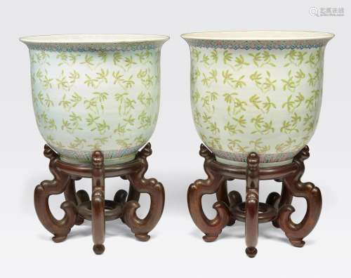 A PAIR OF POLYCHROME ENAMELED PLANTERS WITHORCHID DECORATION