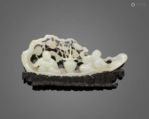 A CARVED JADE MINIATURE FIGURAL GROUP