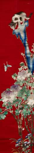 AN EMBROIDERED HANGING SCROLL DEPICTING A CATAND BUTTERFLIES