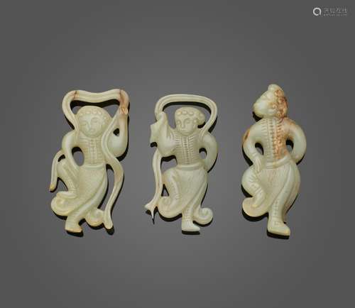 A GROUP OF THREE CARVED JADE FIGURE PLAQUES