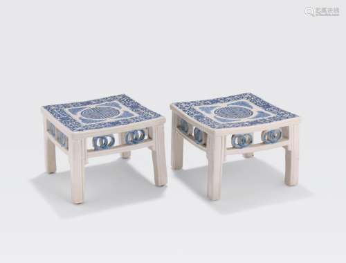 A PAIR OF BLUE AND WHITE PORCELAIN STANDS