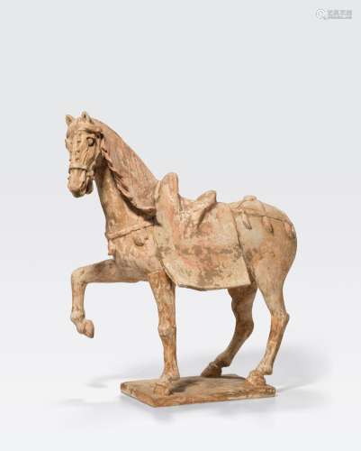 A PAINTED POTTERY MODEL OF A HORSE