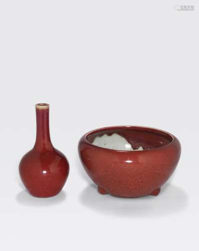 TWO TRANSMUTATION RED GLAZED CONTAINERS