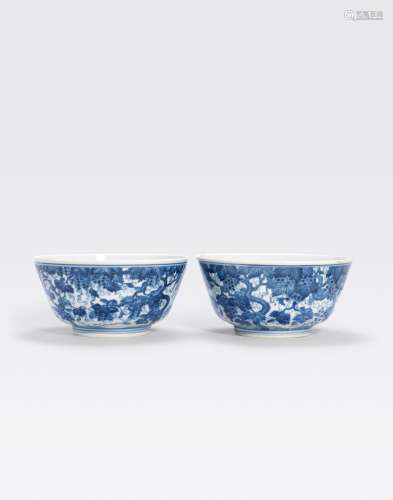 A PAIR OF BLUE AND WHITE BOWLS PAINTED WITHSQUIRRELS IN GRAPE VINES