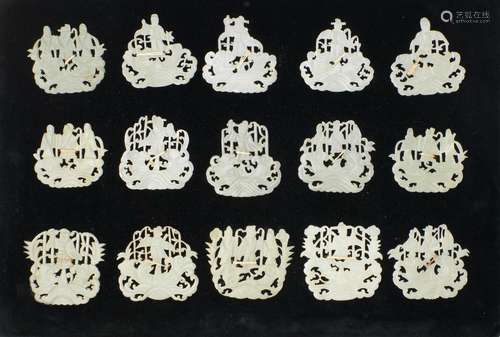 A GROUP OF FIFTEEN JADE PLAQUES WITH RETICULATEDFIGURAL DECORATION