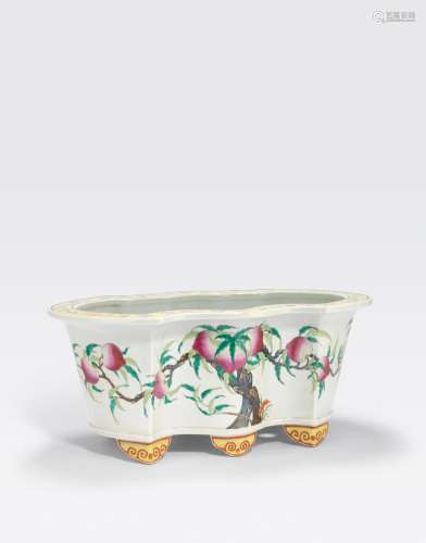 A FAMILLE ROSE ENAMELD NINE-PEACH PLANTER