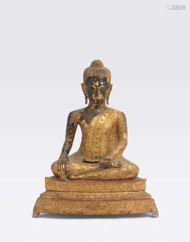 A GILT AND POLYCHROME LACQUERED BRONZE FIGURE OFTHE BUDDHA