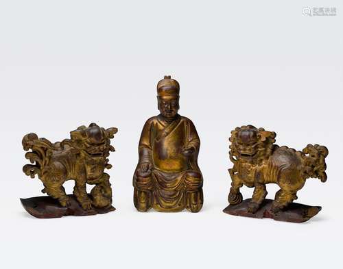 A GROUP OF THREE GILT AND POLYCHROME LACQUEREDWOOD CARVINGS