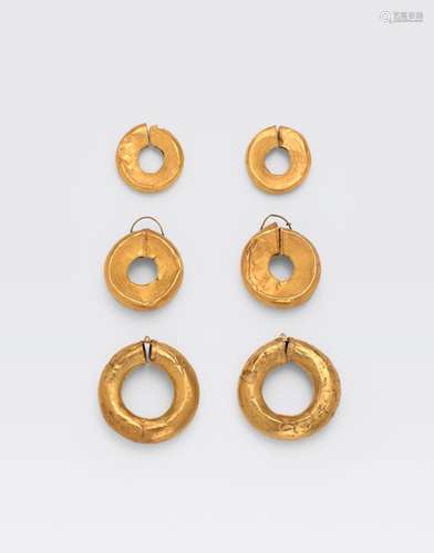 THREE PAIRS OF GOLD SLIT-HOOP EARRINGS